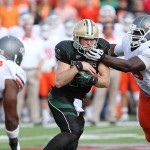 No. 11 quarterback Nick Florence carries the ball down the field. 

Makenzie Mason | Round Up Photo Editor