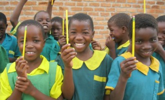 Pencils help African children sharpen school skills