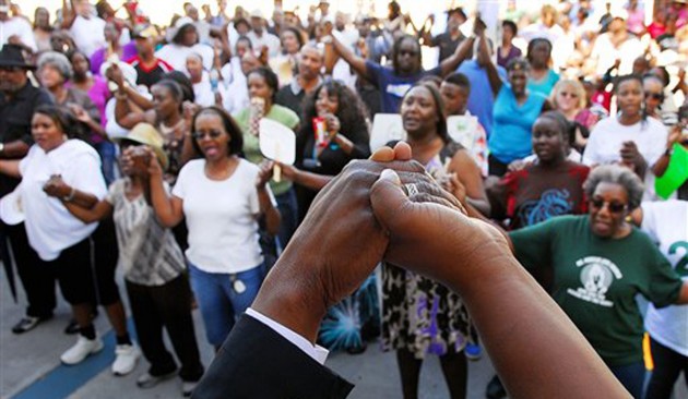 Students hold rally to advocate arrest of black teenager’s shooter