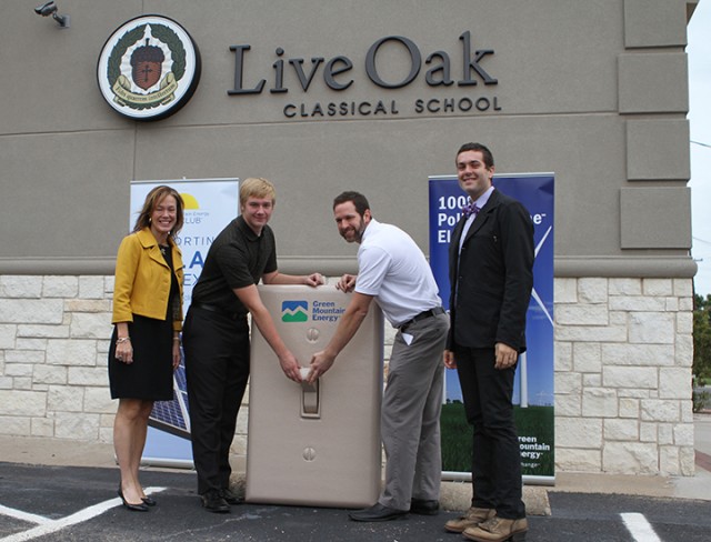 BU freshman helps secure solar panel at local school