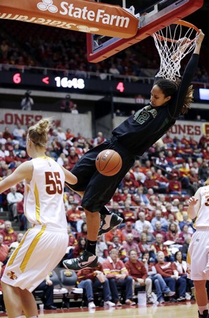 Baylor center Brittney Griner, right, dunks the ball over Iowa State center Anna Prins (55) during the first half of an NCAA college basketball game, Wednesday, Jan. 23, 2013, in Ames, Iowa. (Charlie Neibergall Associated Press)