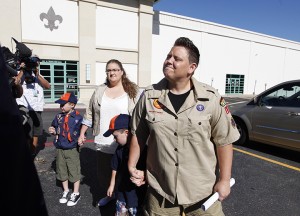 Jennifer Tyrrell, right, arrives with her family for a meeting on July 18, 2012, at the Boys Scouts of America national offices in Irving. The Ohio woman was ousted as a den mother because she is a lesbian. Associated Press