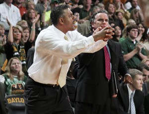 Interim Head Coach Jerome Tang calls out plays during the matchup against Texas in the Ferrell Center on Saturday, Jan. 5, 2013.  Baylor Men's Basketball defeated the Longhorns 86-79 in overtime.Matt Hellman | Lariat Photo Editor