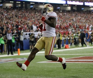 San Francisco 49ers' Frank Gore breaks away for a five-yard touchdown run during the second half of the NFL football NFC Championship game against the Atlanta Falcons Sunday, Jan. 20, 2013, in Atlanta. (AP Photo/Mark Humphrey)