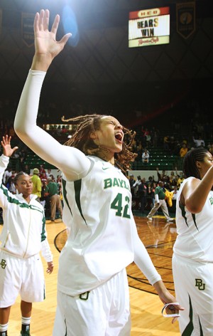No. 42 center Brittney Griner leads a Sic'em with the Lady Bears. Matt Hellman | Lariat Photo Editor