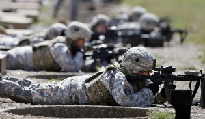 Female soldiers from 1st Brigade Combat Team, 101st Airborne Division train on a firing range while testing new body armor on Sept. 28, 2012, in Fort Campbell, Ky., in preparation for their deployment to Afghani
Associated Press