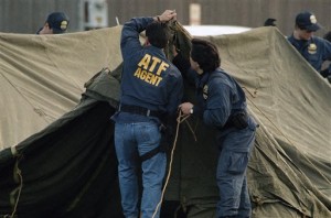 FILE - In the March 2, 1993 file photo, agents of the Bureau of Alcohol, Tobacco and Firearms set up a tent at the command post on the campus of Texas State Technical Institute in Waco, Texas. The 20th anniversary of the botched raid on the Branch Davidians compound passed quietly Thursday, Feb. 28, 2013, as colleagues of the four agents who died gathered in private and local officials made no plans to note the day. The Bureau of Alcohol, Tobacco, Firearms and Explosives held a ceremony in Waco to honor agents Conway LeBleu, Todd McKeehan, Robert John Williams and Steven Willis, the four agents who died in the Feb. 28, 1993 raid. Six Davidian members also died in that raid, which began a 51-day standoff that ended in a fire and the deaths of about 80 more sect members, including two dozen children.  (AP Photo/Rick Bowmer)