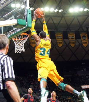 #34 forward Cory Jefferson goes up for a dunk during Baylor men's basketball game against the Texas Tech Red Raiders. Baylor leads 37-25 at halftime at the Ferrell Center on Saturday, Feb. 9, 2013. Travis Taylor | Lariat Photographer