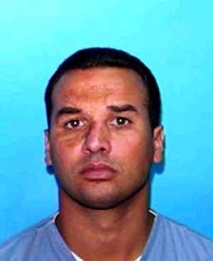 This undated handout photo provided by the Grapevine Police Department shows Alberto Morales. Authorities in Texas continued searching Wednesday  Feb. 13, 2013, for Morales, the escaped Florida prisoner who stabbed a Miami detective and has been described as a schizophrenic who vowed not to return to prison. (AP Photo/Grapevine Police Department)