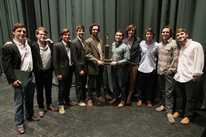 The representatives of Kappa Omega Tau and Kappa Sigma stand with their trophy after they tied for first place at the end of the 2013 All-University Sing on Saturday evening, Feb. 23, 2013, in Waco Hall. Matt Hellman | Lariat Photo Editor