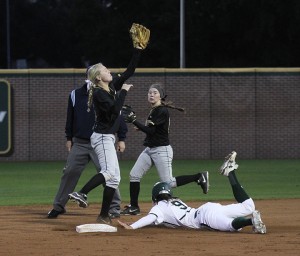 No. 9 infielder Kathy Shelton slides safely into second base during the game against Southern Miss on Tuesday, Feb. 12, 2013, in Getterman Stadium.  Matt Hellman | Lariat Photo Editor