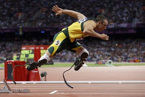  In this Aug.  5, 2012 file photo, South Africa's Oscar Pistorius starts in the men's 400-meter semifinal during the athletics in the Olympic Stadium at the 2012 Summer Olympics in London. Paralympic superstar Oscar Pistorius was charged Thursday, Feb. 14, 2013, with the murder of his girlfriend who was shot inside his home in South Africa, a stunning development in the life of a national hero known as the Blade Runner for his high-tech artificial legs.  Reeva Steenkamp, a model who spoke out on Twitter against rape and abuse of women, was shot four times in the predawn hours in the home, in a gated community in the capital, Pretoria, police said.  Associated Press