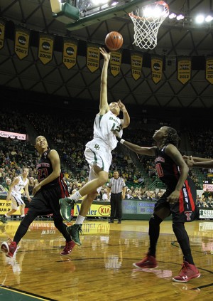 No. 12 Alexis Prince leaps for the shot on Tues., Feb. 12, 2013, at the Ferrell Center, when the Baylor Lady Bears took on the Texas Tech Red Raiders. Meagan Downing | Round Up Photo Editor