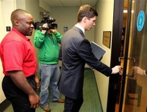 Zachary Maxwell with the Baylor Young Conservatives of Texas delivers a petition to state Sen. Brian Birdwell’s Waco office followed by Mike Cargill of lobby group Central Texas Gun Works. The student group supports Birdwell’s SB 182, which would allow concealed handgun license holders to carry their weapons on public college and university campuses. (Waco Tribune-Herald,Waco,TX)