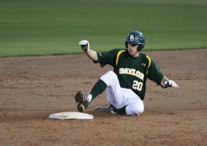 No. 20 infielder Jake Miller slides into second base during the game against Sam Houston State on Tuesday, Mar. 19, 2013, at the Baylor Ballpark.  The Bears were upset by the Bearkats 4-2. Matt Hellman | Lariat Photo Editor