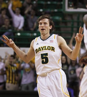 Junior guard Brady Heslip celebrates after hitting a 3-pointer Wednesday against Long Beach State. Baylor won the game 112-66. Heslip scored 28 points and buried eight 3-pointers. (Matt Hellman | Lariat Photo Editor)