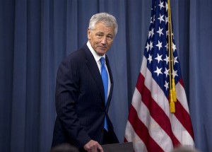 New Defense Secretary Chuck Hagel arrives for a news conference regarding the automatic spending cuts, Friday, March 1, 2013, at the Pentagon. (AP Photo/Carolyn Kaster)