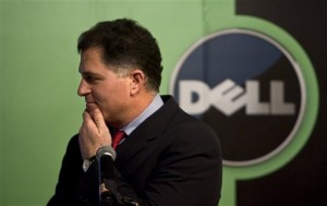 FILE - In this Thursday, March 26, 2009 file photo, Michael Dell, Chairman and CEO of Dell Inc., reacts to a question during a news conference in Beijing. Dell said Monday, March 25, 2013, that a special board committee plans to negotiate with Blackstone Group and activist investor Carl Icahn over new acquisition bids for the computer maker that rival an offer of more than $24 billion from an investor group that includes founder Michael Dell. (AP Photo/Alexander F. Yuan, File)
