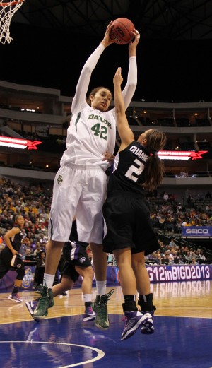 Senior center Brittney Griner grabs a rebound over a Kansas State defender. Meagan Downing | Round Up Photo Editor