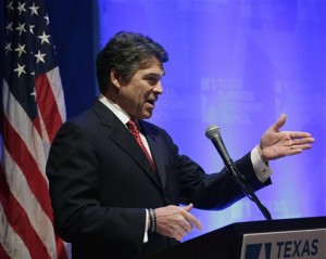 Gov. Rick Perry speaks about education to the Texas Business Leadership Council, Tuesday, Feb. 26, 2013, in Austin, Texas. Perry says he supports taking a hard look at the 15 standardized tests Texas high school students are currently required to take for graduation. (AP Photo/Eric Gay)