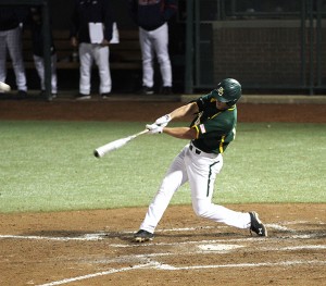 No. 18 Cal Towey hits a bases clearing double during Baylor's game against Dallas Baptist at the Baylor Ballpark on Wednesday, April 3, 2013.  Travis Taylor | Lariat Photographer