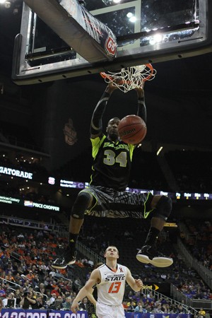 Junior forward Cory Jefferson throws down a two-handed dunk during Baylor’s on March 14 loss to Oklahoma State. Jefferson announced Thursday that he will return for his final season as a Bear. (Matt Hellman | Lariat Photo Editor)
