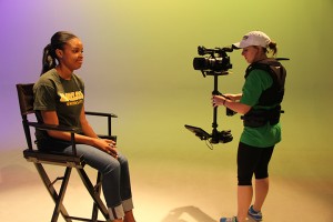 San Antonio senior film and digital media student Breanna Villani practices her steadicam operation on Henderson sophomore Teila Washington. (Jackie Fernandez | Contributor)
