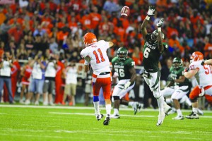 Senior safety Ahmad Dixon tries to deflect the quarterback’s pass against Sam Houston State on Sept. 17, 2012. Dixon is one of the main emotional leaders of the Bears’ defense. Matt Hellman | Lariat Multimedia Editor