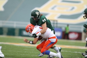 Junior Linebacker Bryce Hager makes a tackle against Sam Houston State on Sept. 17, 2012. Baylor’s defense will look to continue building upon momentum gained late last season. Matt Hellman | Lariat Photo Editor
