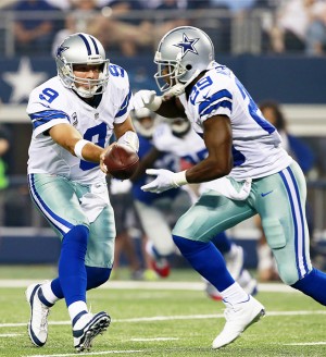 Dallas Cowboys quarterback Tony Romo (9) make a pass to DeMarco Murray (29) during the first half of an NFL football game against the New York Giants, Sunday, Sept. 8, 2013 in Arlington, Texas. (AP Photo/Waco Tribune Herald, Jose Yau)