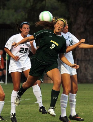 Senior midfielder Alex Klein heads the ball towards goal during Baylor soccer's 4-0 win over Cal-Poly at Betty Lou Mays Field on Friday, September 13, 2013.  The win was Baylor soccer's 14th straight home win.   Travis Taylor | Lariat Photo Editor