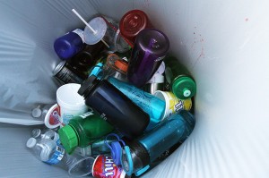 Refillable water bottles lie discarded just outside Floyd Casey Stadium on Saturday, August 31 2013.  Matt Hellman | Lariat Multimedia Editor