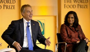 Former British Prime Minister Tony Blair speaks during a panel discussion with Ritu Sharma, Co-Founder and President of Women Thrive Worldwide, and Howard G. Buffett, (not seen) Chairman and CEO of the Howard G. Buffett Foundation, Thursday, Oct. 17, 2013 in Des Moines, Iowa.  Blair is partnering with Howard Buffett and the World Food Prize Foundation to send young entrepreneurs to Africa to work on hunger and poverty issues. (AP Photo/Scott Morgan)