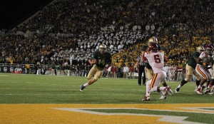 Junior quarterback Bryce Petty races untouched into the end zone in Baylor’s 71-7 win over Iowa State last        Saturday at Floyd Casey Stadium. The No. 8 Bears head to Kansas to take on the Jayhawks on Saturday. Constance Atton | Lariat Photographer