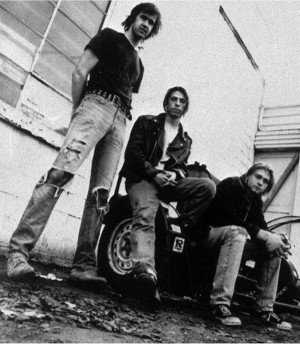 FILE - Members of the band Nirvana shown in a 1991 file photo, from left, Krist Novoselic, David Grohl, and Kurt Cobain.  Nirvana, Linda Ronstadt, Peter Gabriel, Hall and Oates, and The Replacements are among first-time nominees to the Rock and Roll Hall of Fame. The hall of fame announced its annual list of nominees Wednesday morning, Oct. 16, 2013, and half the field of 16 were first-time nominees. (AP Photo/Chris Cuffaro, File)