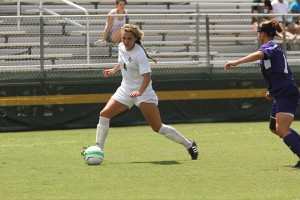 Freshman defender Emory Cason controls the ball and looks to pass against Northwestern State in a match at Betty Lou Mays Soccer Field on Aug. 25.  The Bears only have four matches remaining before the Big 12 tournament. Travis Taylor | Lariat Photo Editor