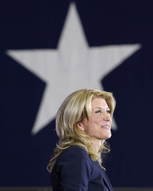 Sen. Wendy Davis, D-Fort Worth, smiles as she addresses supporters at a rally Thursday, Oct. 3, 2013, in Haltom City, Texas.  Davis formally announced her campaign to run for Texas governor (AP Photo/LM Otero)