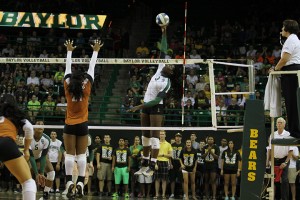 Senior outside hitter Zoe Adom makes a play against Texas on Oct. 2 at the Ferrell Center. The Bears head to Morgantown to take on WVU tonight. Travis Taylor | Lariat Photo Editor