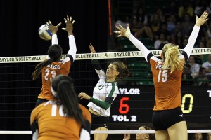 Sophomore outside hitter Laura Jones goes up for a spike during Baylor volleyball's game against the  University of Texas on Wednesday, October 2, 2013 at the Ferrell Center.   Travis Taylor | Lariat Photo Editor