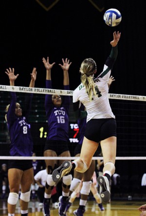 Sophomore outside hitter Thea Munch-Soegaard prepares to spike the ball against TCU on Wednesday night at the Ferrell Center. The Bears lost the match 3-0 to TCU and are 9-12 overall and 1-4 in Big 12 play. Constance Atton I Lariat Photographer