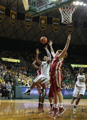 Senior guard Odyssey Sims drives to the hoop against Texas at the Ferrell Center on Feb. 23. With All-American Brittney Griner now in the WNBA, Sims is the clear leader of the Lady Bears on and off the court. Sims hopes to keep Baylor’s winning tradition alive this season as a senior.  Matt Hellman | Lariat Multimedia Editor