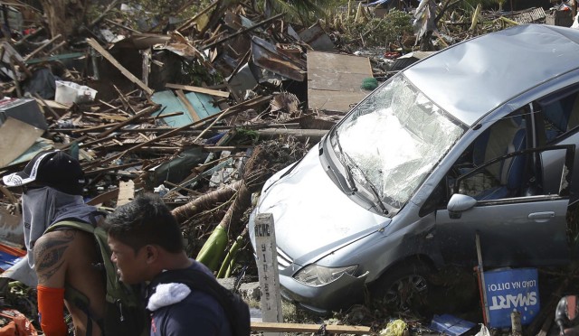 Typhoon survivors seek to flee