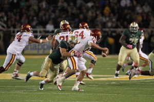 Senior linebacker Eddie Lackey sacks Iowa State sophomore quarterback Sam Richardson on Oct. 19 at Floyd Casey Stadium. Lackey is the leader of the defense and has been the spark plug behind Baylor’s rise as the No. 7 scoring defense in the FBS.  Travis Taylor | Lariat Photo Editor