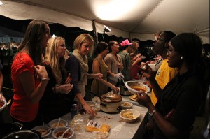 Students gather around the line for a taste of the best concoctions at last year’s Chili Cook-Off hosted by Chi Omega and Alpha Tau Omega. Lariat File Photo