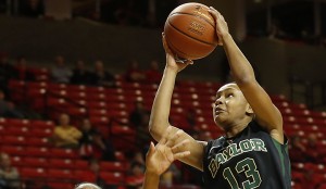 Baylor's Nina Davis, right, shoots over Texas Tech's Amber Battle during an NCAA college basketball game in Lubbock, Texas, Wednesday, Feb. 12, 2014. (AP Photo/The Avalanche-Journal, Tori Eichberger)