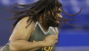 Baylor offensive lineman Cyril Richardson runs a drill at the NFL football scouting combine in Indianapolis, Saturday, Feb. 22, 2014. (AP Photo/Michael Conroy)