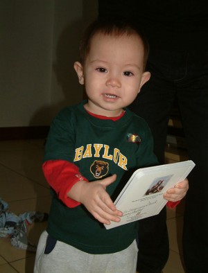 David wears his Baylor shirt while awaiting the Cates’ arrival to China. The Cates sent multiple gifts to David before meeting him. Courtesy Art
