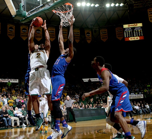 Sophomore forward Rico Gathers moves in for two points at Tuesday's game against the Kansas Jayhawks. Carlye Thornton | Lariat Photographer