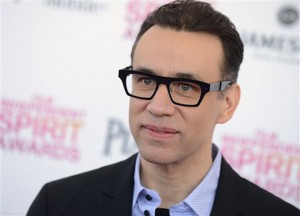 FILE - In this Feb. 23, 2013 file photo, actor Fred Armisen arrives at the Independent Spirit Awards in Santa Monica, Calif.  Seth Meyers says former comedy colleague Fred Armisen will lead the band when he takes over NBCís ìLate Night.î Meyers tweeted Monday, Feb. 10, 2014, that his former ìSaturday Night Liveî castmate will ìcurate and leadî the band, running it even while away shooting ìPortlandia,î Armisenís IFC comedy series. NBC confirmed the news. Armisen is best known as a comic performer from ìPortlandiaî and his decade at ìSNL.î But he began show business as a drummer, principally for the punk-rock band Trenchmouth in the 1990s. He will handle vocals and guitar for ìLate Nightísî 8G Band.  (Photo by Jordan Strauss/Invision/AP, File)