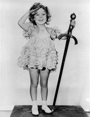 FILE - In this 1933 file photo, child actress Shirley Temple is seen in her role as "Little Miss Marker". Shirley Temple, the curly-haired child star who put smiles on the faces of Depression-era moviegoers, has died. She was 85. (AP Photo/File)